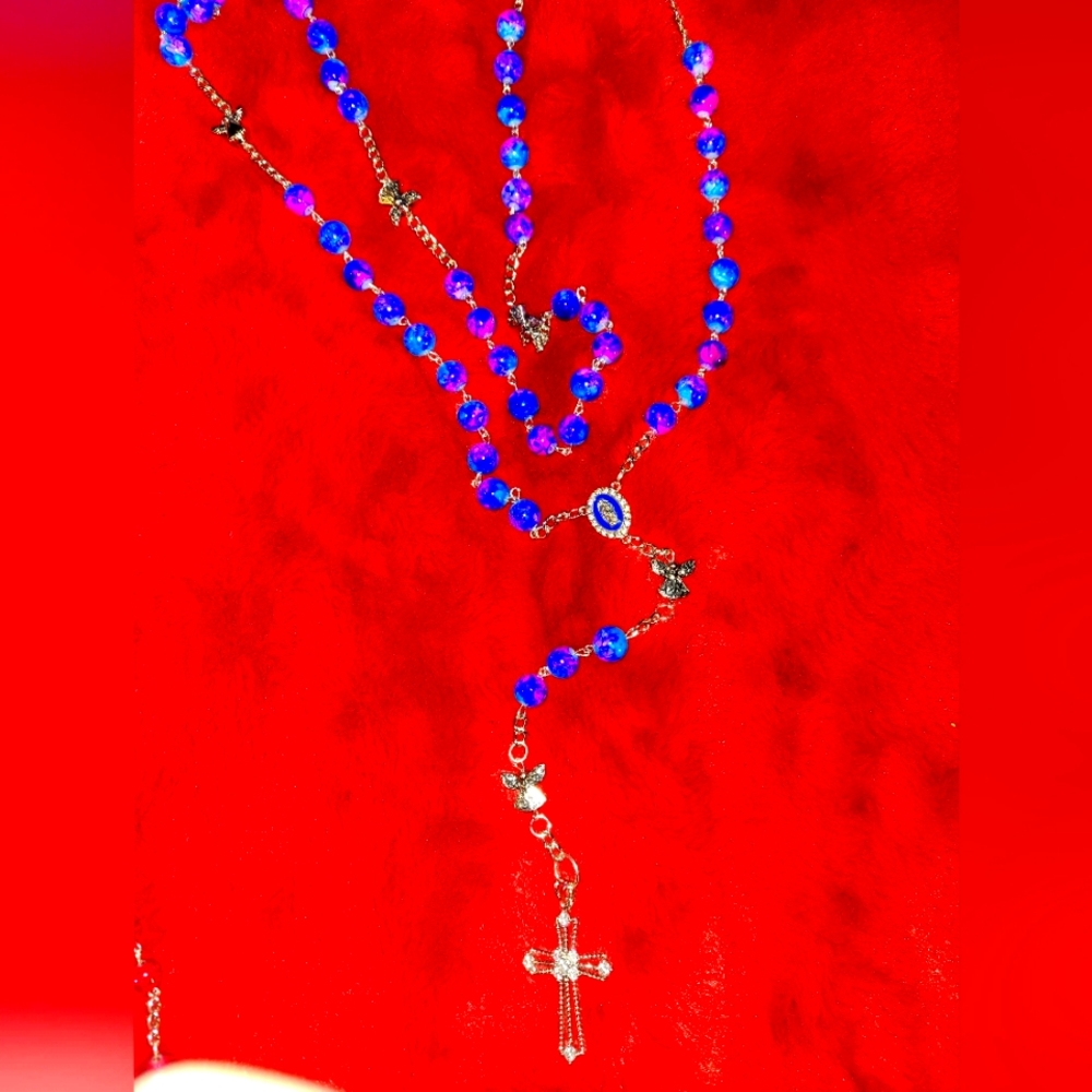 custom made rosaries this one is blue with pink swirls